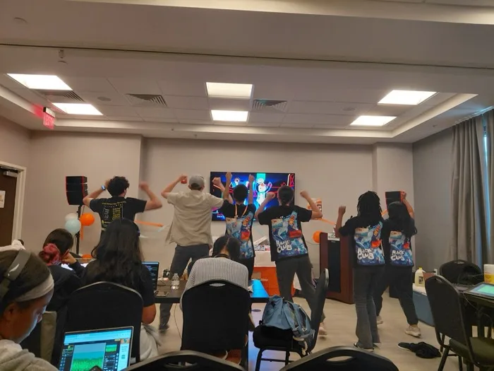 Attendees celebrating at an event
